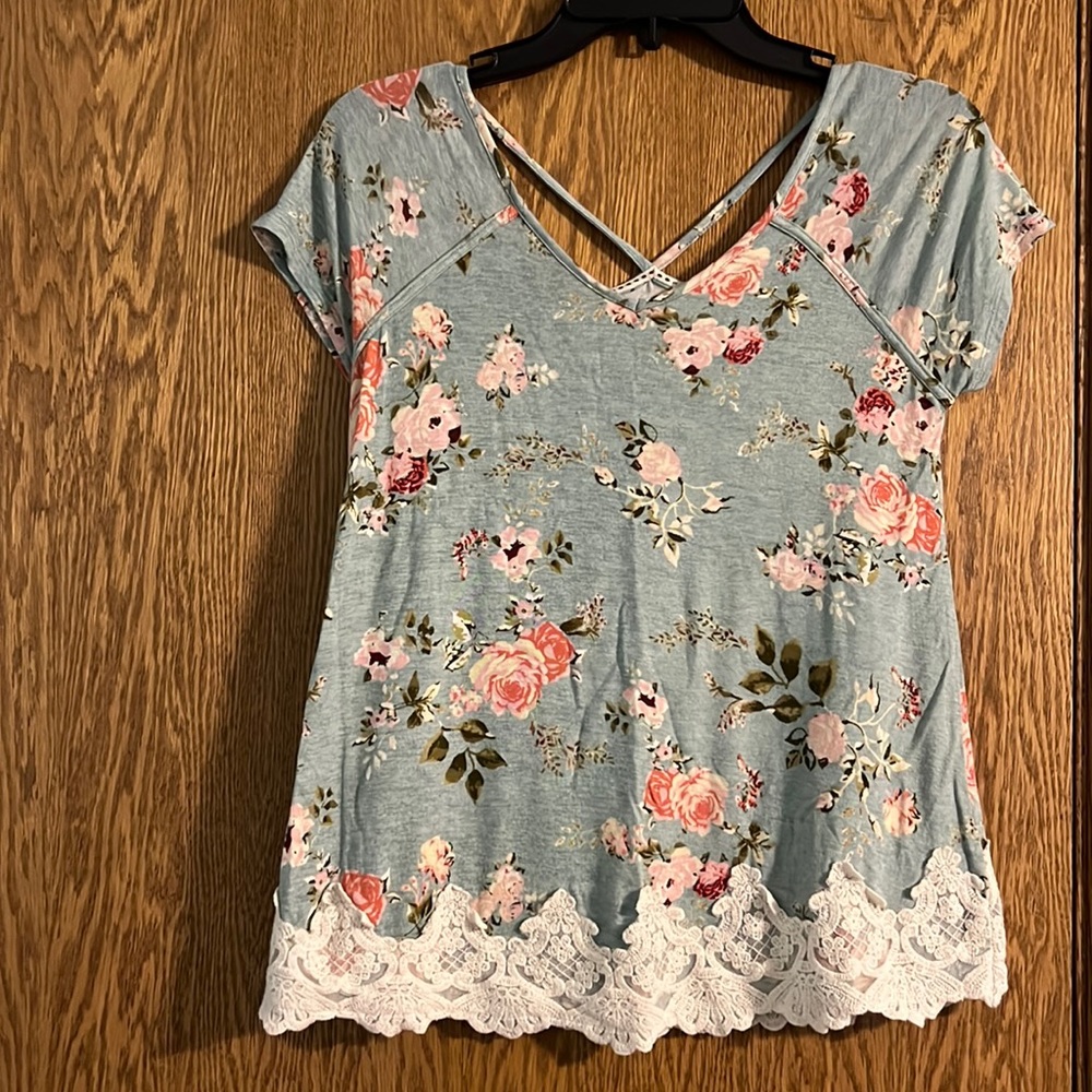 Aqua floral top with crocheted hem and cross-cross back